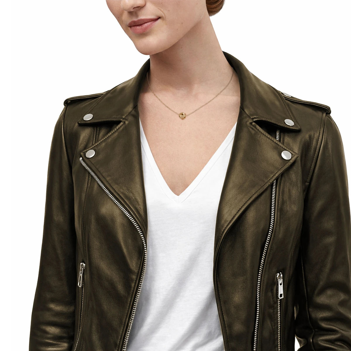 Model in a dark leather jacket and white V-neck tee wearing a fine gold necklace with a small knot pendant